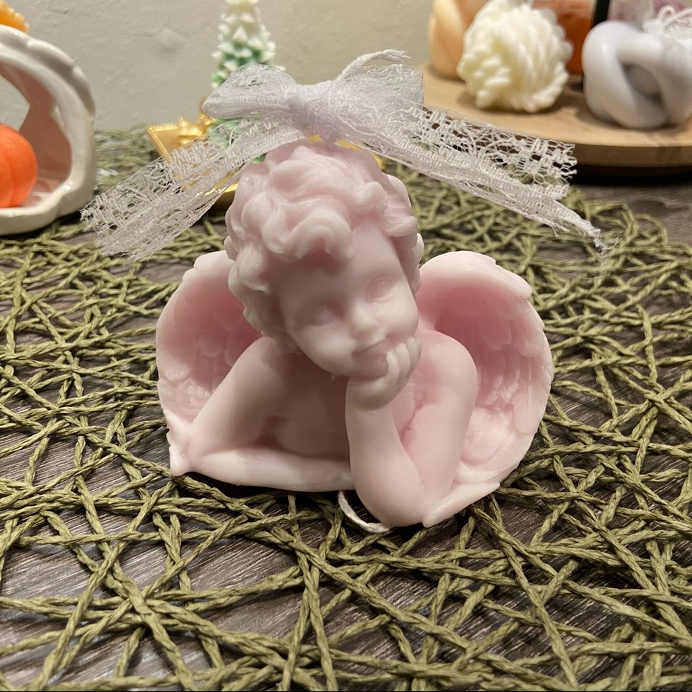 Handmade scented holiday angel candles for decoration